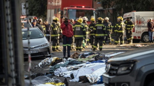 Incendie à Johannesburg: Pris au piège dans un immeuble en flammes