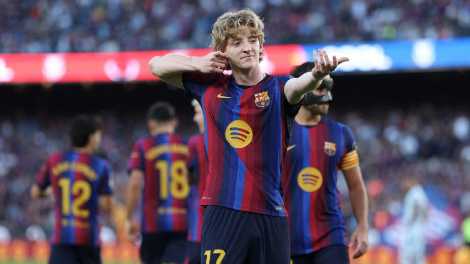 Gordon nets first Barca goal as Liga leaders beat Getafe