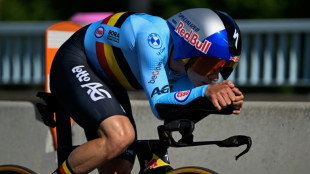 Evenepoel wins record 4th straight world time-trial title