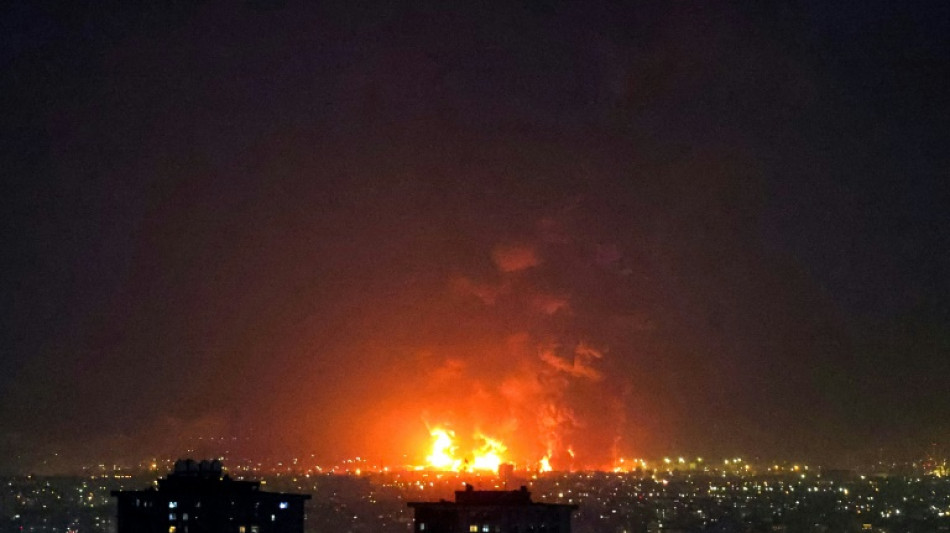 Tehran plunged into darkness by smoke from burning oil