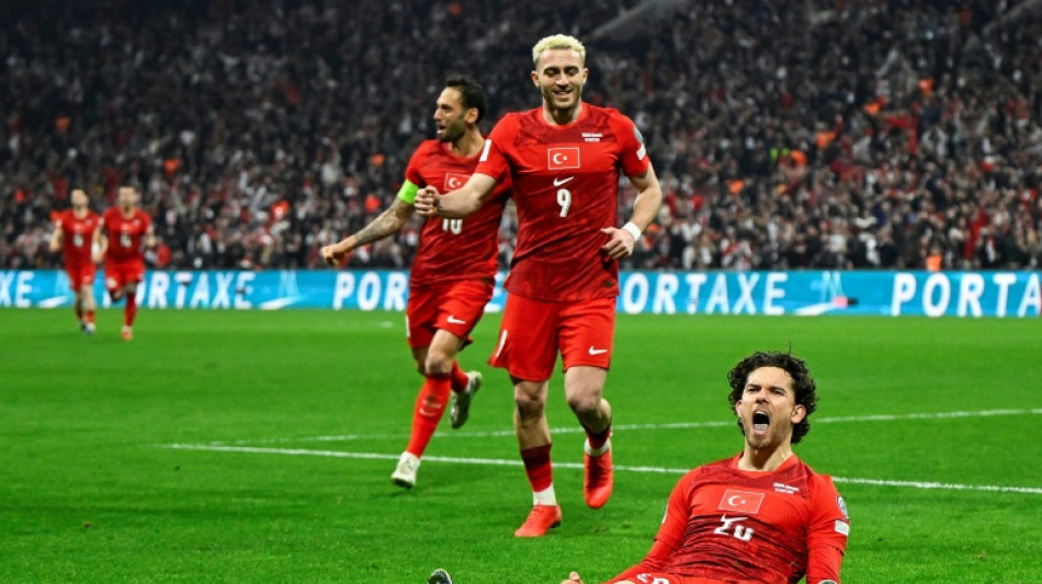 Kadioglu fires Turkey past Romania, to brink of World Cup