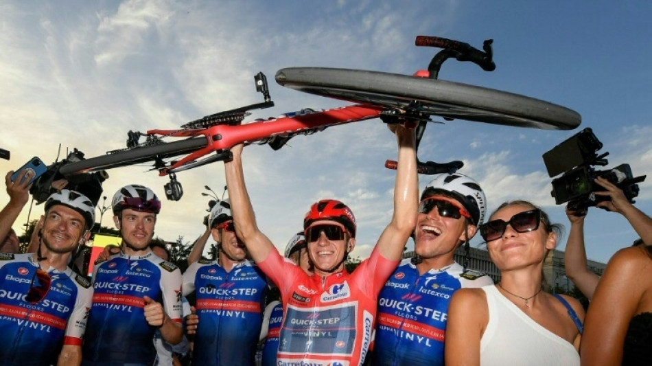 Belgian Evenepoel wins first Grand Tour in Vuelta a Espana
