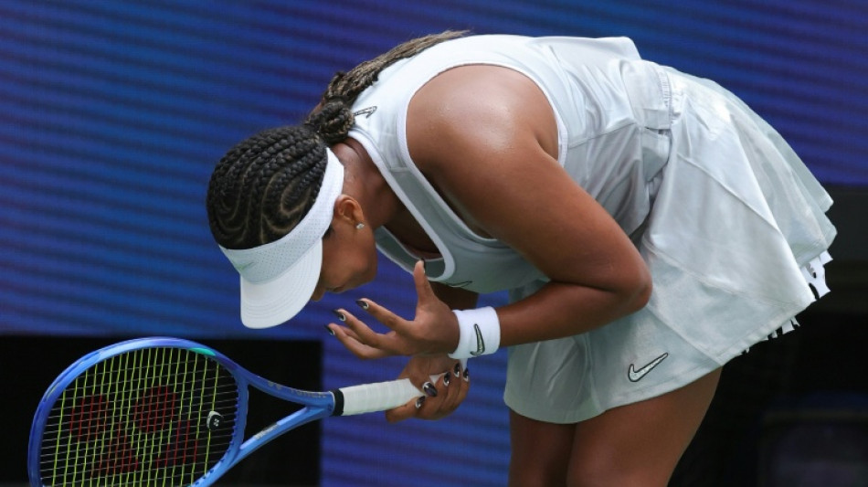Osaka squeezes into US Open third round
