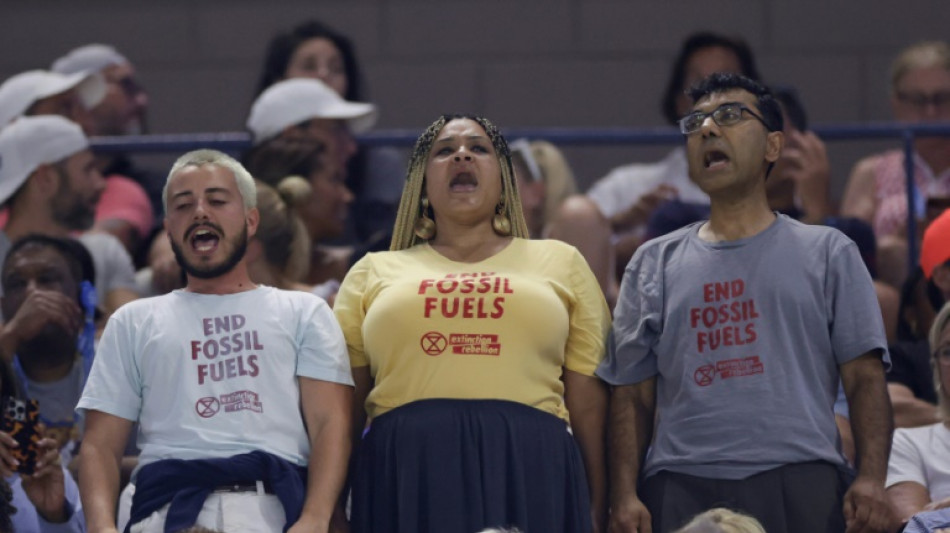 US Open semi-final halted after protest
