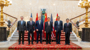 Stocks mostly fall as China-US resume trade talks