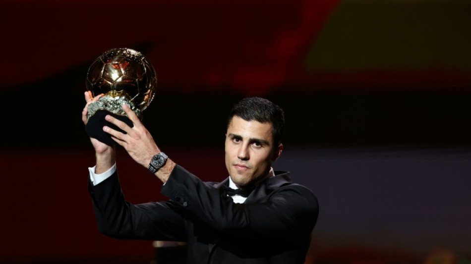 Guardiola comemora Bola de Ouro de Rodri ap&oacute;s 'longa espera' do futebol espanhol