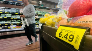 Stocks slide on US inflation surge, tech weakness 