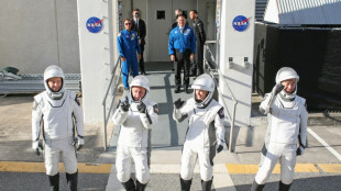 SpaceX Crew Dragon docks with International Space Station