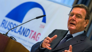 Germany's Schroeder to remain in ruling party despite Putin ties