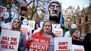 Assisted dying campaigners, opponents rally at UK parliament