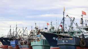 Thousands of Chinese boats mass at sea, raising questions