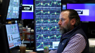 Wall Street finit en ordre dispersé dans l'attente de nouveaux droits de douane américains
