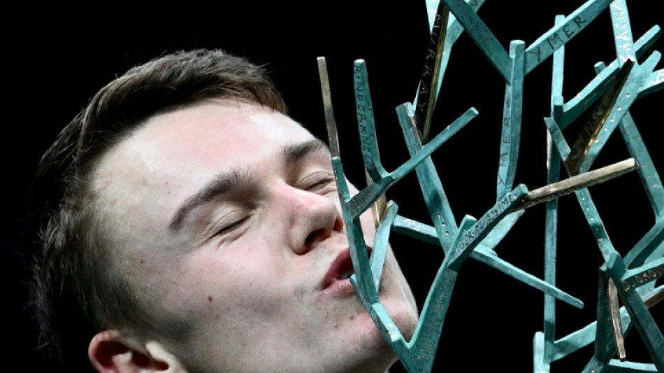 Rune breaks into top ten after Paris Masters triumph