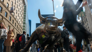 US stocks retreat from records as tech giants fall