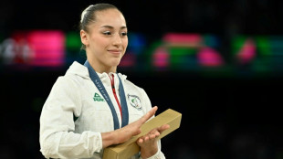 Argelina conquista 1&ordf; medalha ol&iacute;mpica da &Aacute;frica na gin&aacute;stica com ouro nas barras assim&eacute;tricas