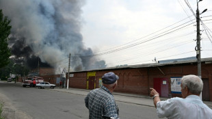 Fierce shelling in eastern Ukraine as NATO heralds its 'historic' expansion
