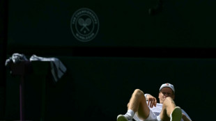 Bloodied but unbowed: Sinner avoids shock exit at start of Wimbledon title defence